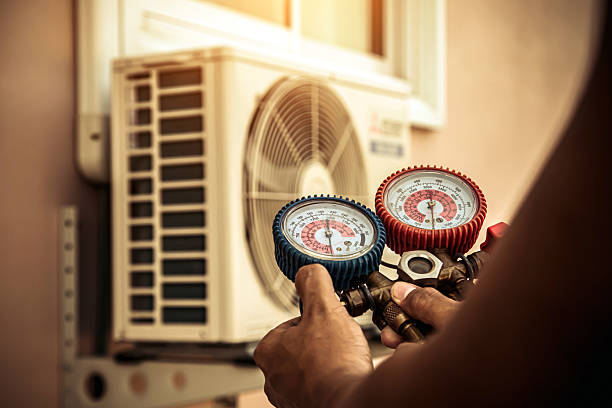 Professional Air Conditioning Service technician working in Islip, NY